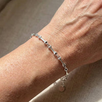 Bracelet bone with pendants in silver